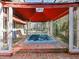 Relaxing hot tub with covered patio at 2395 Windward Cv, Kissimmee, FL 34746
