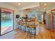 Kitchen with breakfast bar, pool view, and stainless steel appliances at 2395 Windward Cv, Kissimmee, FL 34746