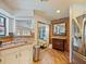 Kitchen features granite countertops and white cabinets at 2395 Windward Cv, Kissimmee, FL 34746