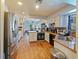 Kitchen boasts stainless steel appliances and granite countertops at 2395 Windward Cv, Kissimmee, FL 34746