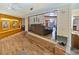 Open living room with brick fireplace and hardwood floors at 2395 Windward Cv, Kissimmee, FL 34746