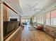 Spacious living room with pool view and comfortable seating at 2395 Windward Cv, Kissimmee, FL 34746