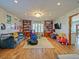 Fun playroom with hardwood floors and toys at 2395 Windward Cv, Kissimmee, FL 34746