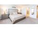 Spacious bedroom with king-size bed and ensuite bathroom at 2472 Dubai St, Kissimmee, FL 34747
