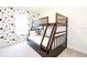 bedroom with Mickey Mouse wallpaper and a built-in bunk bed at 2472 Dubai St, Kissimmee, FL 34747