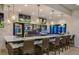 Community bar with seating and TVs at 2472 Dubai St, Kissimmee, FL 34747