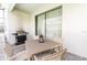 Outdoor patio with table, chairs, and grill at 2472 Dubai St, Kissimmee, FL 34747
