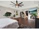 Main bedroom suite with a fireplace, TV, and en-suite bathroom at 2583 Grassmoor Loop, Apopka, FL 32712