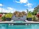 Relaxing spa with water feature and lush landscaping at 2583 Grassmoor Loop, Apopka, FL 32712
