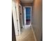 Bright hallway with doors to bedrooms and bath at 2607 Briana Ct, Orlando, FL 32837