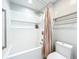 Clean bathroom with a white tub and shower at 2749 Abney Ave, Orlando, FL 32833