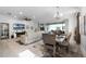 Elegant dining area with large table and chandelier at 2777 Southland St, St Cloud, FL 34772