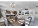 Spacious dining area adjacent to kitchen and living room at 2777 Southland St, St Cloud, FL 34772