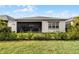 Charming house exterior with landscaped yard and screened patio at 2777 Southland St, St Cloud, FL 34772