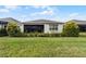 Well-maintained house exterior, featuring a large backyard at 2777 Southland St, St Cloud, FL 34772