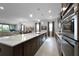 Open concept kitchen features a large island and stainless steel appliances at 2777 Southland St, St Cloud, FL 34772