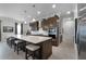 Modern kitchen with large island and stainless steel appliances at 2777 Southland St, St Cloud, FL 34772