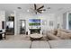 Relaxing living room with sectional sofa and fireplace at 2777 Southland St, St Cloud, FL 34772