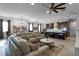 Open floor plan with a kitchen, dining, and living area at 2777 Southland St, St Cloud, FL 34772