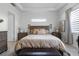 Comfortable main bedroom with a plush bed and plenty of natural light at 2777 Southland St, St Cloud, FL 34772