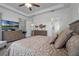 Bright main bedroom with ample space for furniture and a large TV at 2777 Southland St, St Cloud, FL 34772