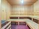 Community sauna with wooden benches and flooring at 2777 Southland St, St Cloud, FL 34772