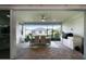 Spacious screened patio with outdoor dining area and built-in grill at 2777 Southland St, St Cloud, FL 34772