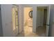 Hallway between a bedroom, closet and bathroom at 32512 Oak Park Dr, Leesburg, FL 34748