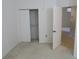 Bedroom featuring carpeted floors and an open closet at 32512 Oak Park Dr, Leesburg, FL 34748