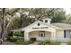 Pennbrooke Fairways fitness center featuring a small turret and landscaping at 32512 Oak Park Dr, Leesburg, FL 34748