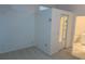 Bedroom with access to a closet and bathroom, neutral carpet at 32512 Oak Park Dr, Leesburg, FL 34748