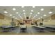 A spacious meeting room is well-lit with an American flag featured at the head at 32512 Oak Park Dr, Leesburg, FL 34748