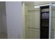 Bright walk-in closet features built-in shelving and closet rod at 32512 Oak Park Dr, Leesburg, FL 34748