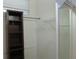 Spacious walk-in closet features built-in shelving and ample storage space at 32512 Oak Park Dr, Leesburg, FL 34748