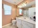 Clean bathroom with white vanity and a shower/tub combo at 3713 Doune Way, Clermont, FL 34711