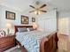 Spacious bedroom with a wooden sleigh bed and ample closet space at 3713 Doune Way, Clermont, FL 34711