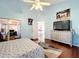 Relaxing Primary bedroom with a large bed and dresser at 3713 Doune Way, Clermont, FL 34711