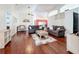 Open living room showcasing hardwood floors and ample natural light at 3713 Doune Way, Clermont, FL 34711