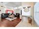 Spacious living room with hardwood floors and comfortable seating at 3713 Doune Way, Clermont, FL 34711