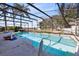 Inviting screened pool with ample space for relaxation at 4023 W Ponkan Rd, Apopka, FL 32712