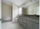 Modern bathroom with granite countertops and a walk-in shower at 4456 Sagefield Dr, Harmony, FL 34773