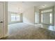 Bright and spacious dining area with large windows and neutral carpeting at 4456 Sagefield Dr, Harmony, FL 34773