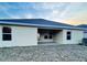 House exterior view showcasing the back patio at 4456 Sagefield Dr, Harmony, FL 34773