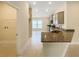 Modern kitchen with granite countertops and stainless steel appliances at 4456 Sagefield Dr, Harmony, FL 34773