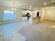 Open concept kitchen with granite countertops and stainless steel appliances at 4464 Sagefield Dr, Harmony, FL 34773