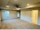 Spacious main bedroom with ceiling fan and access to bathroom at 4464 Sagefield Dr, Harmony, FL 34773