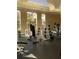 Community gym with various weightlifting machines, treadmills and ample natural lighting at 5548 Metrowest Blvd # 101, Orlando, FL 32811