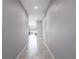Bright and spacious hallway with tile flooring at 5681 Western Sun Dr, St Cloud, FL 34771
