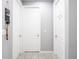 Simple hallway with two closed doors at 5681 Western Sun Dr, St Cloud, FL 34771