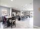 Open concept kitchen with island and stainless steel appliances at 5681 Western Sun Dr, St Cloud, FL 34771